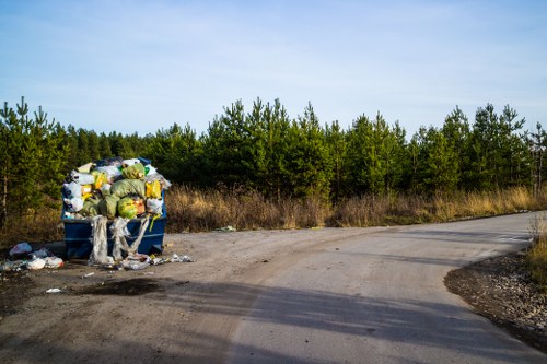 Construction site waste being cleared by experts